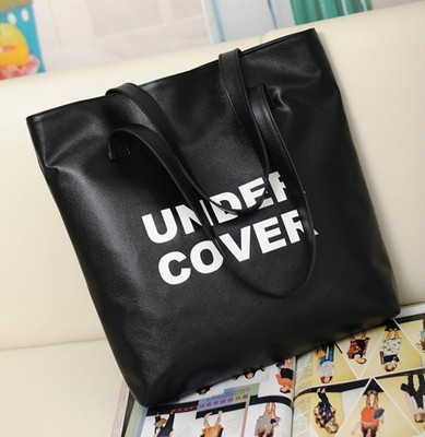 厂家直销2017新款UN字母简约时尚单肩大容量包包通勤女包邮