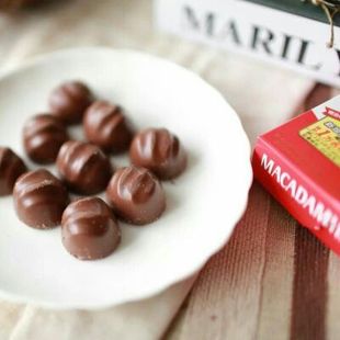日本明治澳洲坚果夹心巧克力香醇独特焙煎正品送女友情人节礼物